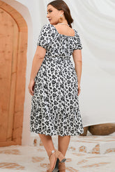 Robe midi fleurie à manches courtes grande taille